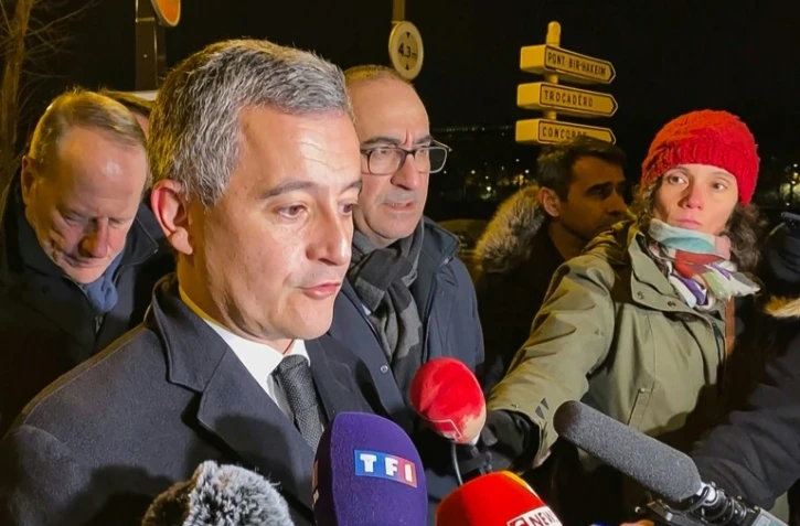 Le ministre de l'Intérieur Gérald Darmanin à côté du préfet de police de Paris Laurent Nunez (au centre), le 3 décembre 2023