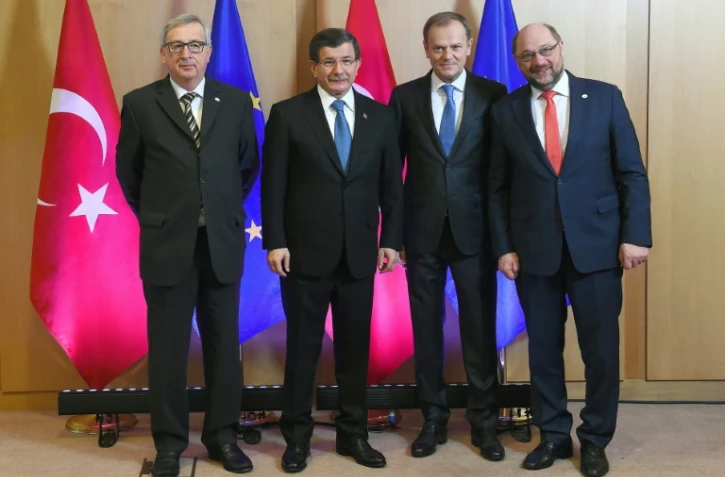Le président de la Commission européenne Jean-Claude Juncker, le Premier ministre turc Ahmet Davutoglu, Le président du Conseil européen Donald Tusk et le le président du Parlement européen Martin Schulz à Bruxelles, le 7 mars 2016