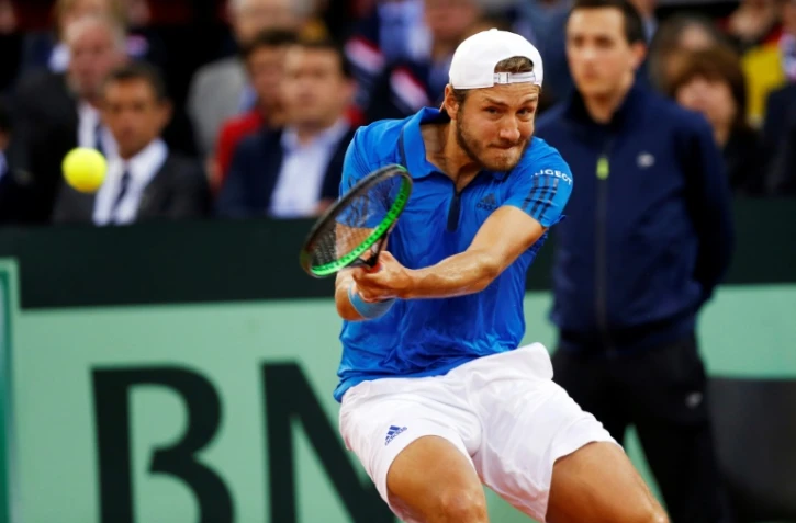Le Français Lucas Pouille face au Britannique Kyle Edmund en quarts de finale de Coupe Davis, le 7 avril 2017 à Rouen
