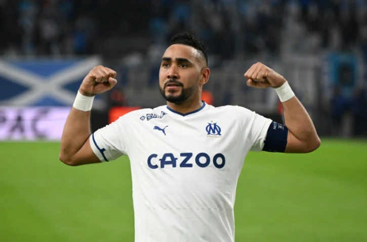 Le milieu de terrain français de Marseille Dimitri Payet célèbre le deuxième but de son équipe lors du match de L1 entre l'Olympique de Marseille et le SCO d'Angers, à Marseille, le 14 mai 2023