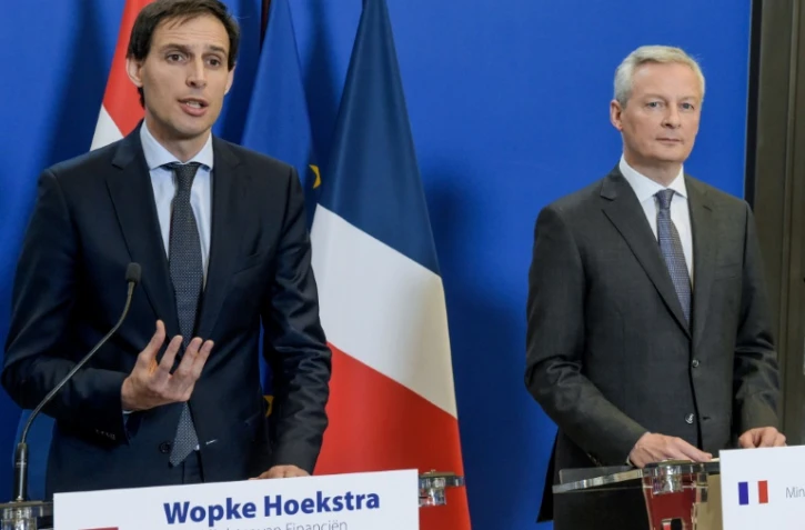 Le ministre de l'Economie  Bruno Le Maire (d) et son homologue Wopke Hoekstra (g) lors d'une conférence de presse à Paris, le 1er mars 2019
