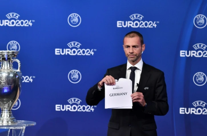 Le président de l'UEFA Aleksander Ceferin annonce que l'Allemagne organisera l'Euro-2024 de football lors d'une cérémonie au siège de l'UEFA à Nyon, en Suisse, le 27 septembre 2018