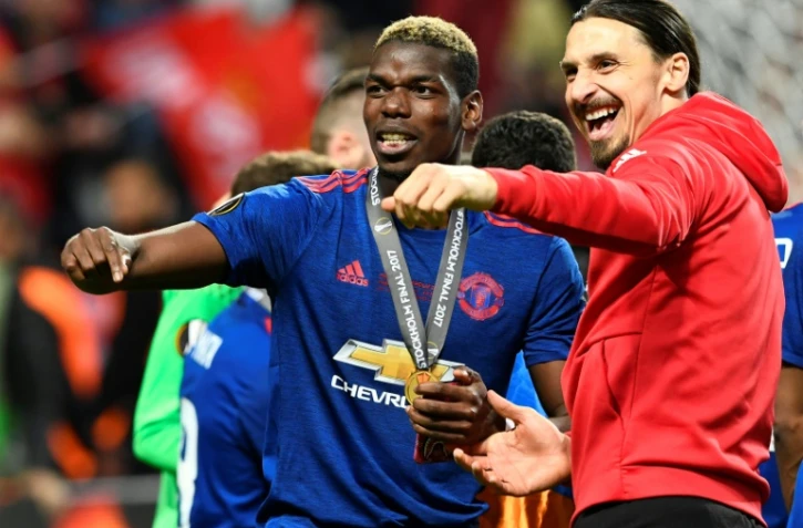 Leur retour à Manchester United est attendu samedi: Paul Pogba et Zlatan Ibrahimovic, le 24 mai 2017 après la victoire finale en Europa League face à l'Ajax à Solna (près de Stockholm)