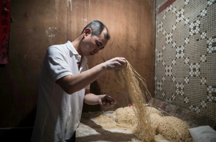 Lau Fat-cheong, l'un des derniers fabricants traditionnels de nouilles, à Hong Kong le 25 juillet 2017