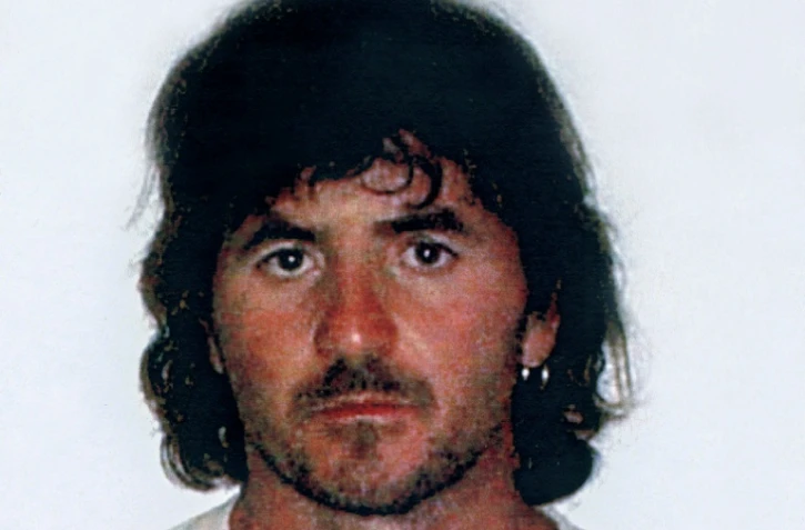 Photo d'Yvan Colonna prise le 4 juillet 2003 après son arrestation en Corse pour l'assassinat du préfet Erignac