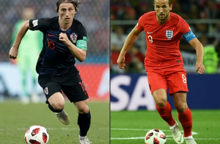 Le milieu croate Luka Modric (g), à Sotchi, le 7 juillet 2018, et l'Anglais Harry Kane à Moscou, le 3 juillet 2018