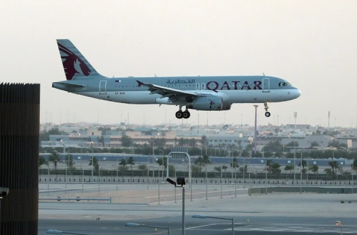 Un avion de la Qatar Airways atterrit à l'aéroport de Doha, le 12 juin 2017