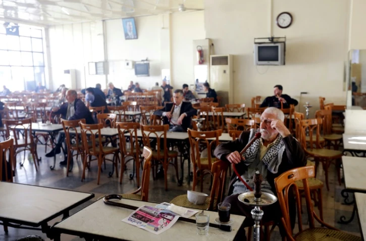 Retour au calme dans un café de Damas le 27 février 2016, au premier jour d'une trêve entre les forces du régime et les rebelles