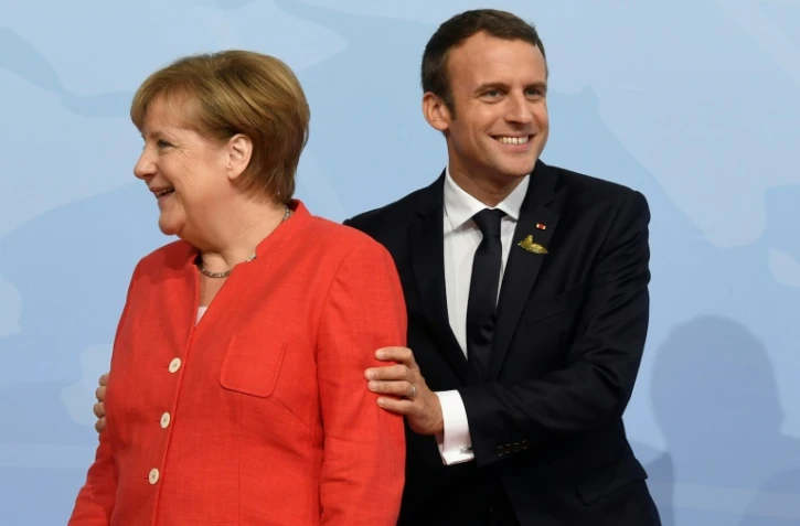 La chancelière allemande Angela Merkel et le président français Emmanuel Macron au sommet du G20 à Hambourg, au nord de l'Allemagne, le 7 juillet 2017
