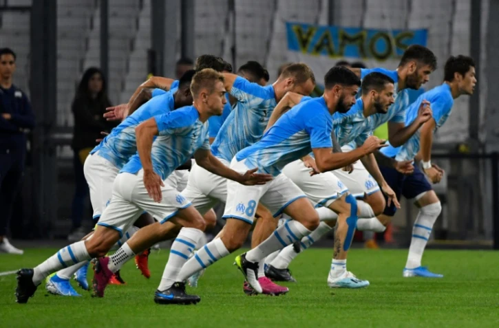 Les joueurs de Marseille accélèrent leur échauffement avant d'affronter Rennes, lors du dernier match de L1 au Velodrome, le 29 septembre 2019