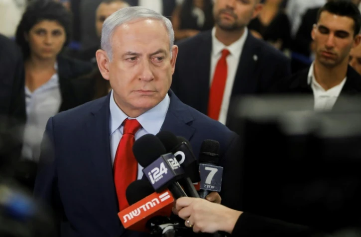 Le Premier ministre israélien Benjamin Netanyahu répond aux questions des journalistes après un vote du Parlement sur sa dissolution, le 29 mai 2019 à Jérusalem