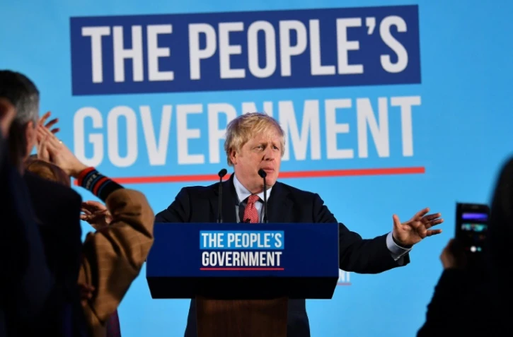 Le Premier ministre britannique Boris Johnson célèbre sa victoire aux élections législatives le 13 décembre 2019 dans le centre de Londres
