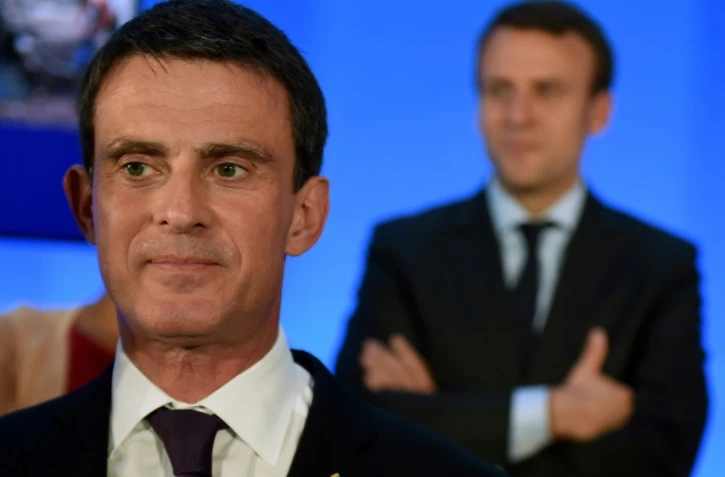 Manuel Valls (g) et Emmanuel Macron, le 20 mai 2016 à Privas