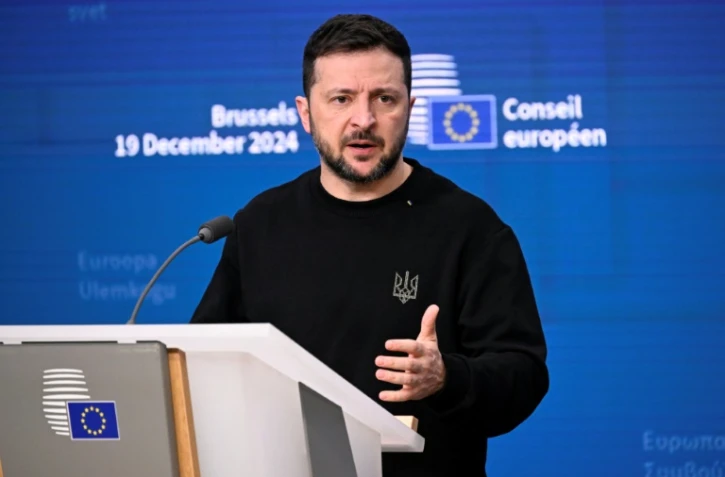 Le président ukrainien Volodymyr Zelensky lors d'une conférence de presse à Bruxelles, le 19 décembre 2024