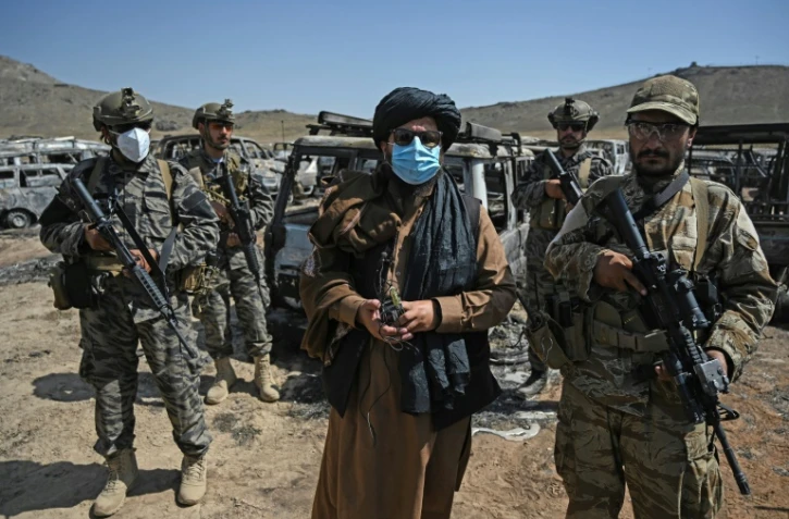 Des membres de la "Badri 313", unité d'élite des talibans, sur l'ex-base de la CIA dans le district de Deh Sabz près de Kaboul, le 6 septembre 2021