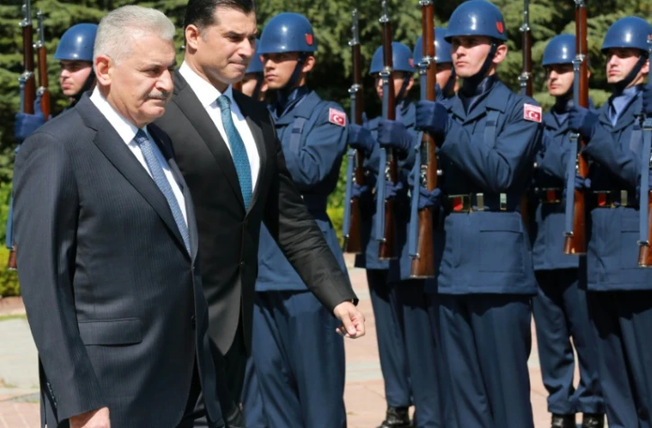 Le Premier ministre turc Binali Yildirim et le Premier ministre chypriote turc Huseyin Ozgurgun le 26 juillet 2016 à Ankara