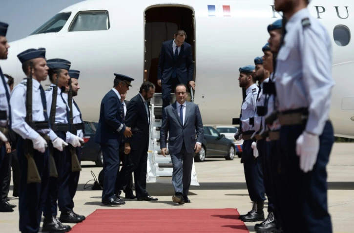 "Les terroristes veulent nous diviser, nous monter les uns contre les autres", déclare François Hollande ajoutant : "mon devoir est que nous soyons unis", lors d'une visite à Lisbonne le 19 juillet 2016