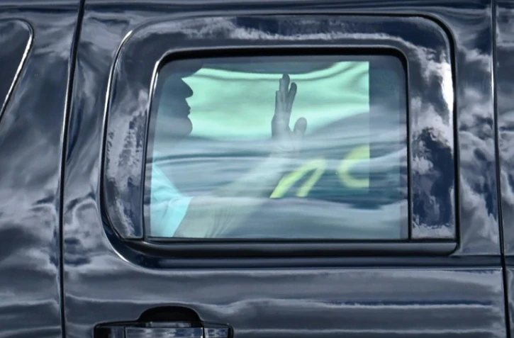 Le président américain Donald Trump quitte le Trump International Golf Club, à Wes Palm Beach, en Floride, le 29 décembre 2020