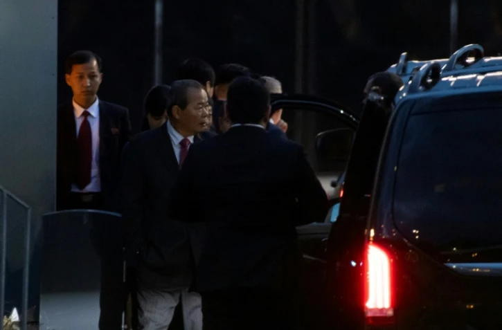 Des membres de la délégation nord-coréenne arrivent à l'aéroport de Stockholm, le 3 octobre 2019 en Suède