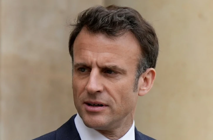 Le président français Emmanuel Macron à l'Elysee à Paris le 14 avril 2023