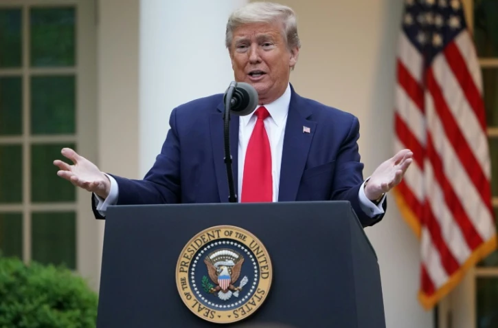 Le président américain Donald Trump depuis le jardin de la Maison Blanche, lors de sa conférence de presse, le 14 avril 2020