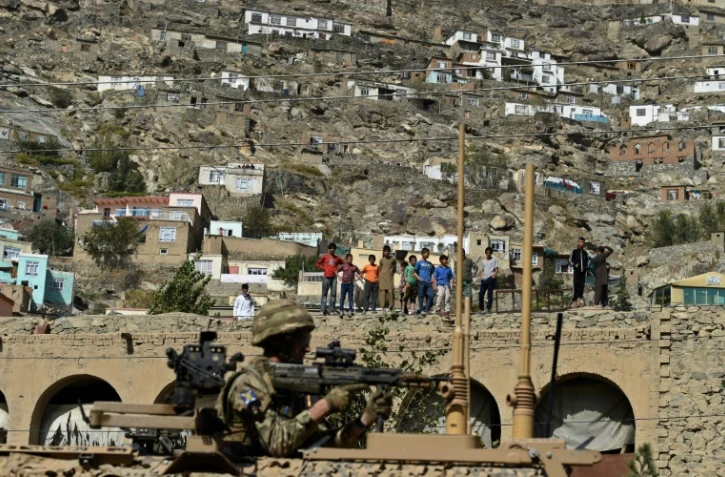 Des soldats de l'Otan patrouillent le 11 octobre 2015 à Kaboul 