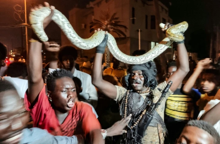 Célébrations à Port-Soudan après l'annonce de la prise de la capitale Khartoum par l'armée, le 26 mars 2025