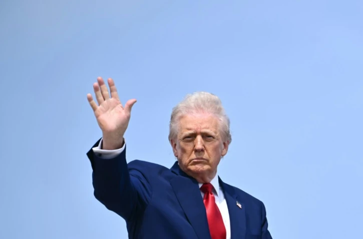 Donald Trump au moment d'embarquer à bord d'Air Force One, à la base aérienne Andrews près de Washington, le 3 avril 2025