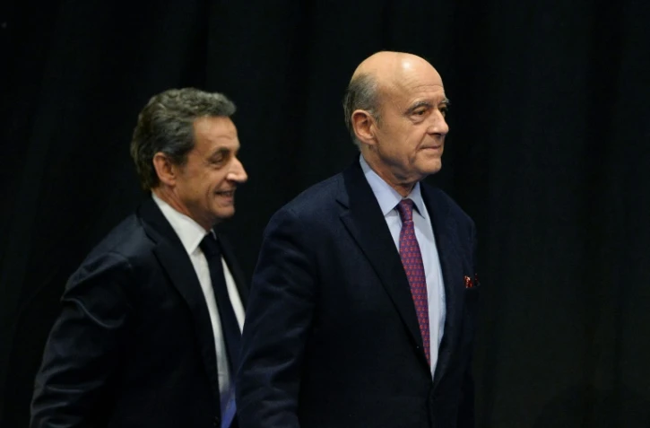 Nicolas Sarkozy (g) et Alain Juppé, le 14 octobre 2015 à Limoges
