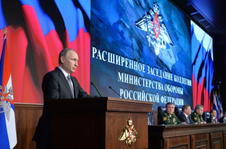 Le président russe Vladimir Poutine lors d'une réunion avec le conseil de la Défense à Moscou, le 11 décembre 2015