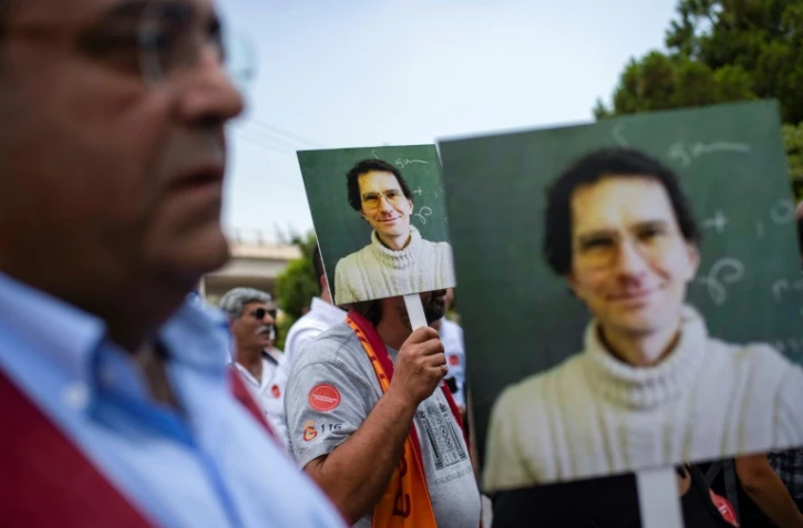Des manifestants défilent à Balikesir, dans l'ouest de la Turquie, pour montrer leur soutien au mathématicien turc Tuna Altinel, le 30 juillet 2019