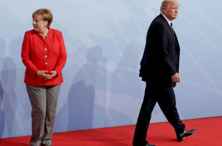 La chancelière allemande Angela Merkel et le président américain Donald Trump lors d'un sommet du G20 à Hambourg, en ALlemagne, le 7 juillet 2017