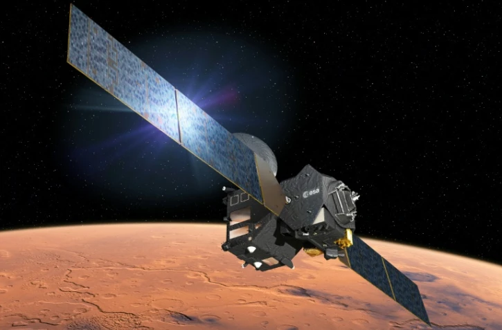 Illustration d'artiste diffusée sur le site web de l'Agence spatiale européenne, le 1er mars 2016, montrant le module d'entrée, de descente et d'atterrissage Schiaparelli de la sonde TGO en route pour Mars