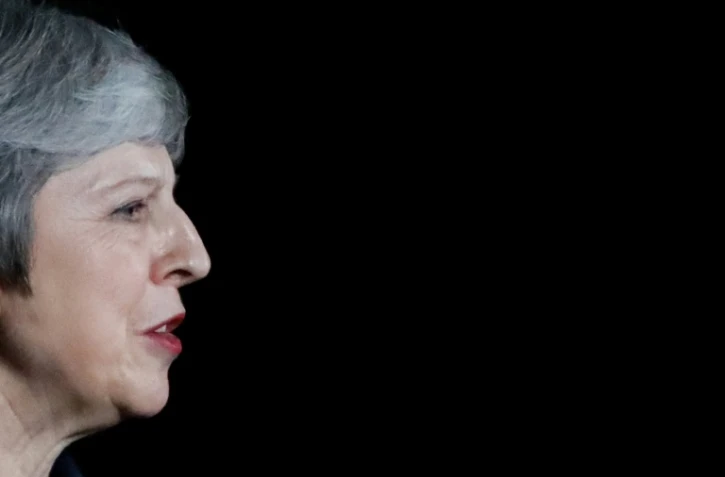 Theresa May doit convaincre le Parlement britannique qui votera en décembre pour ou contre le projet d'accord élaboré avec l'Union européenne mardi (photo prise lors de sa déclaration à la presse le 14 novembre 2018 à Londres)