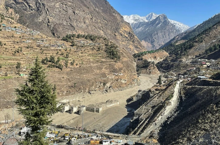 Vue d'ensemble du projet hydrélectrique étatique NTPC, endommagé par une crue déclenchée par la chute d'un glacier dans une rivière, près de Joshimath, dans l'Etat de l'Uttarakhand (nord de l'Inde), le 7 février 2021