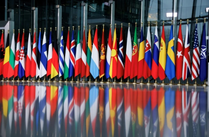 Les drapeaux des pays membres de l'Otan au siège de l'Alliance à Bruxelles le 3 avril 2024 