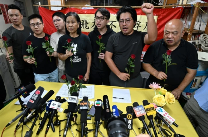 Des membres de la Ligue des Sociaux-Démocrates (LSD), qui était l'un des derniers partis d'opposition encore actifs à Hong Kong, lors d'une conférence de presse, le 29 juin 2025 à Hong kong
