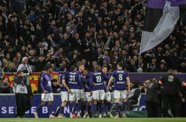 Les joueurs de Toulouse avec leur flocage WO=MAN lors du match nul contre Monaco (1-1) à Toulouse en Ligue 1 le 7 mars 2025