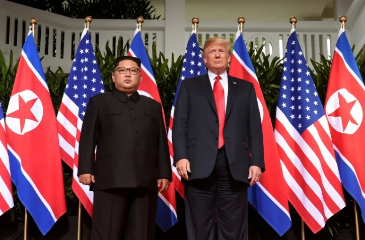 Donald Trump et Kim Jong Un lors de leur première rencontre, le 12 juin 2018 à Singapour