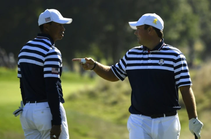 Les golfeurs américains Tiger Woods et Patrick Reed lors d'un entraînement avant la Ryder Cup, le 26 septembre 2018 à Saint-Quentin-en-Yvelines