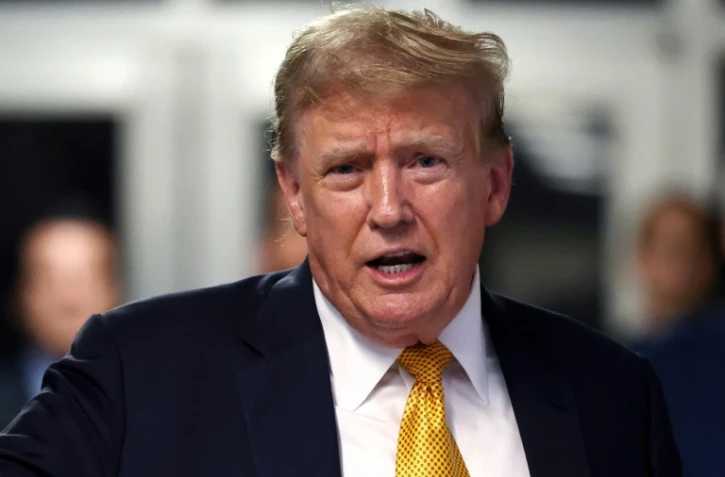 L'ancien président américain Donald Trump à la sortie du tribunal pénal de Manhattan, le 21 mai 2024 à New York