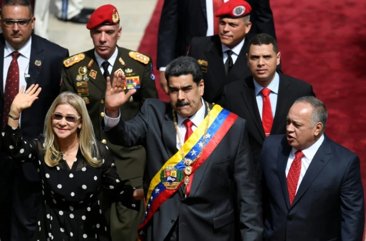 Le président du Venezuela Nicolas Maduro (centre) et son épouse Lady Cilia Flores (gauche) au Parlement à Caracas le 14 janvier 2020, ont été capturés et ex-filtrés de leur pays, selon Donald Trump
