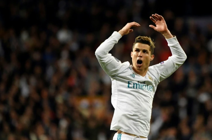 L'attaquant vedette du Real Madrid Cristiano Ronaldo exulte après avoir inscrit un but face à la Juventus en quarts de finale retour de C1, le 3 avril 2018 à Turin