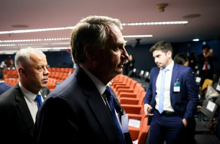 Photo diffusée par la Cour suprême du Brésil de l'ex-président Jair Bolsonaro (centre) lors d'une session à la Cour suprême, qui va décider de l'ouverture ou ou non d'un procès à son encontre, le 25 mars 2025 à Brasilia