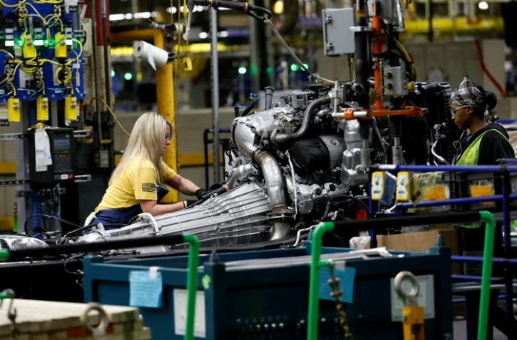 Des employés de General Motors dans une usine de la ville de Flint, dans le Michigan, le 12 juin 2019