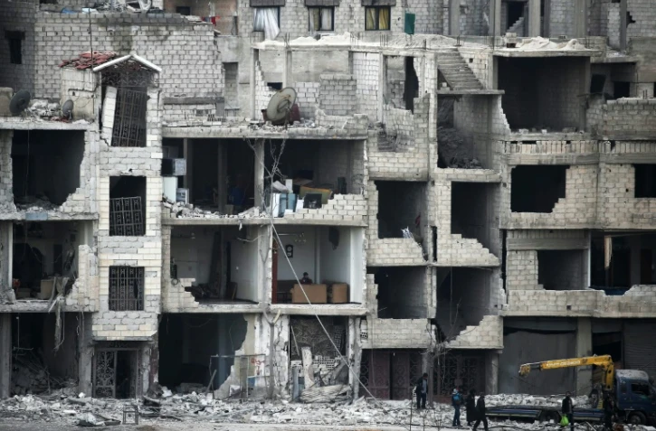 Des immeubles détruits par les bombardements du régime syrien à Arbine, dans la Ghouta orientale, le 25 février 2018