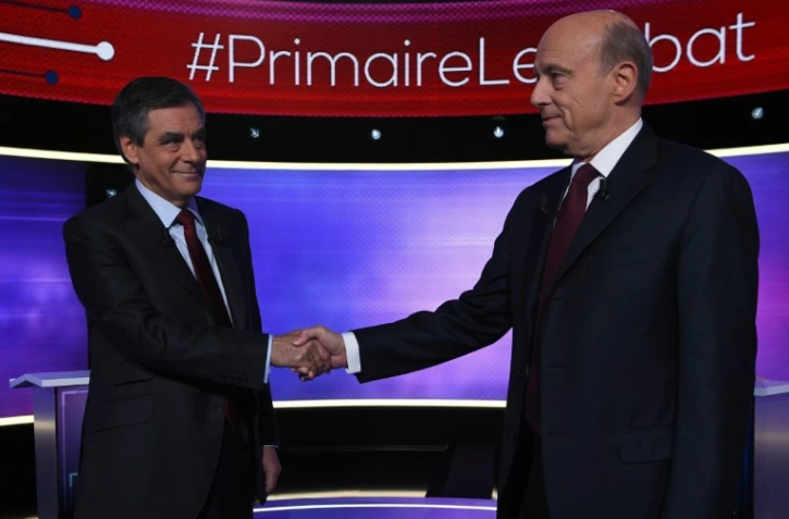 François Fillon et Alain Juppé, candidats à la primaire de la droite à Paris avant un débat télévisé, le 24 novembre 2016