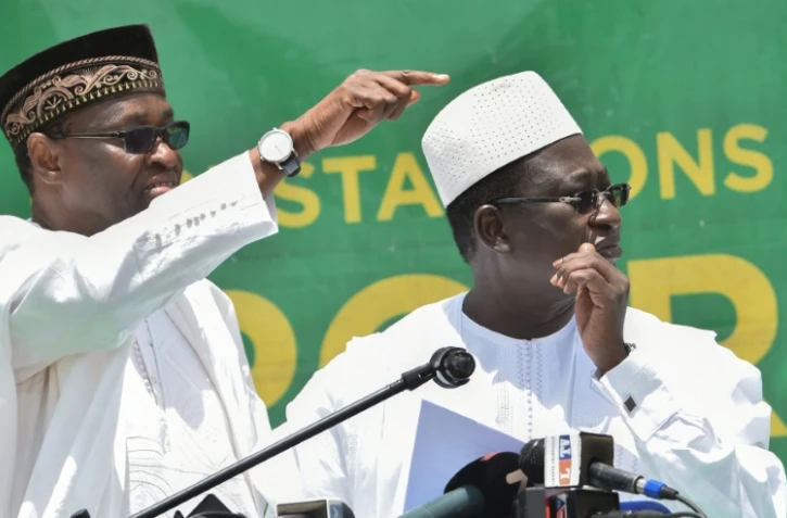 Tiébilé Dramé, chef de campagne, et Soumaïla Cissé, candidat de l'opposition, à Bamako au Mali, le 3 août 2018