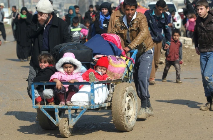 Irakiens déplacés par les combats dans Mossoul, le 24 mars 2017