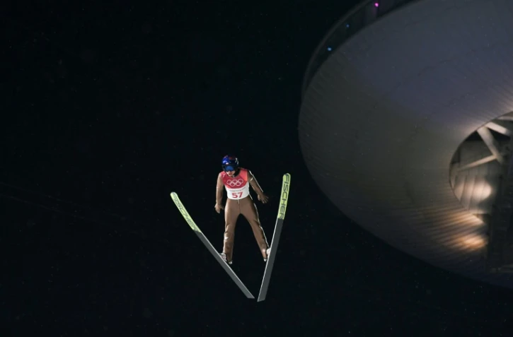 Le Polonais Kamil Stoch, tenant du titre, remporte le saut à skis sur grand tremplin, à Pyeongchang le 17 février 2018